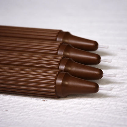Crown-Forming Taper Candle Brown