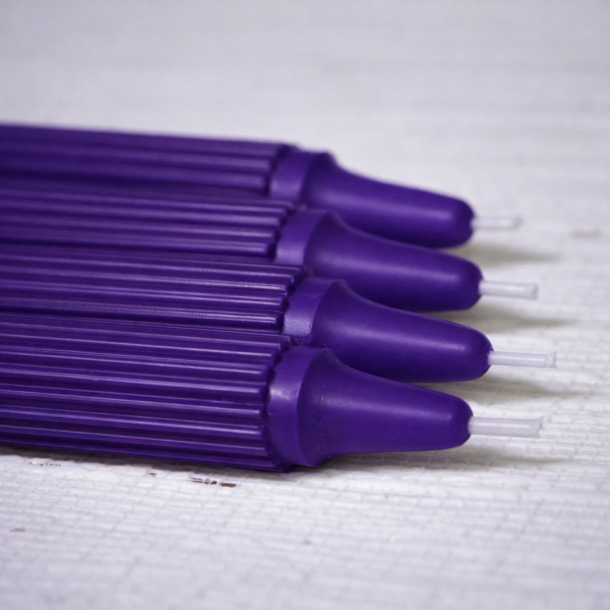 Crown-Forming Taper Candle Dark Purple