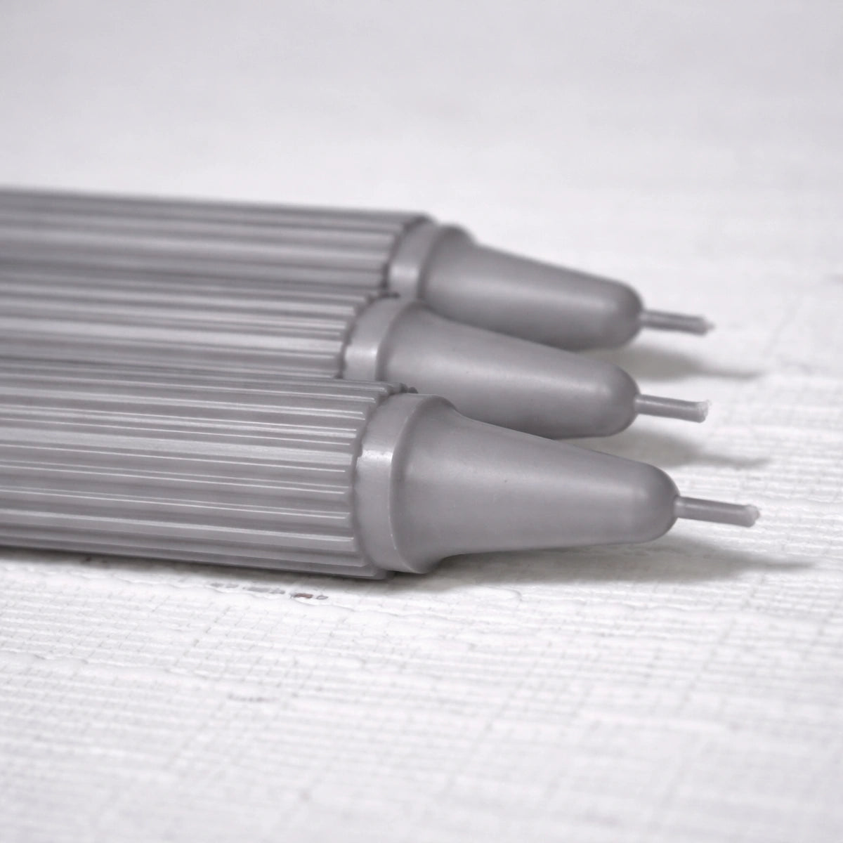 Crown-Forming Taper Candle Gray