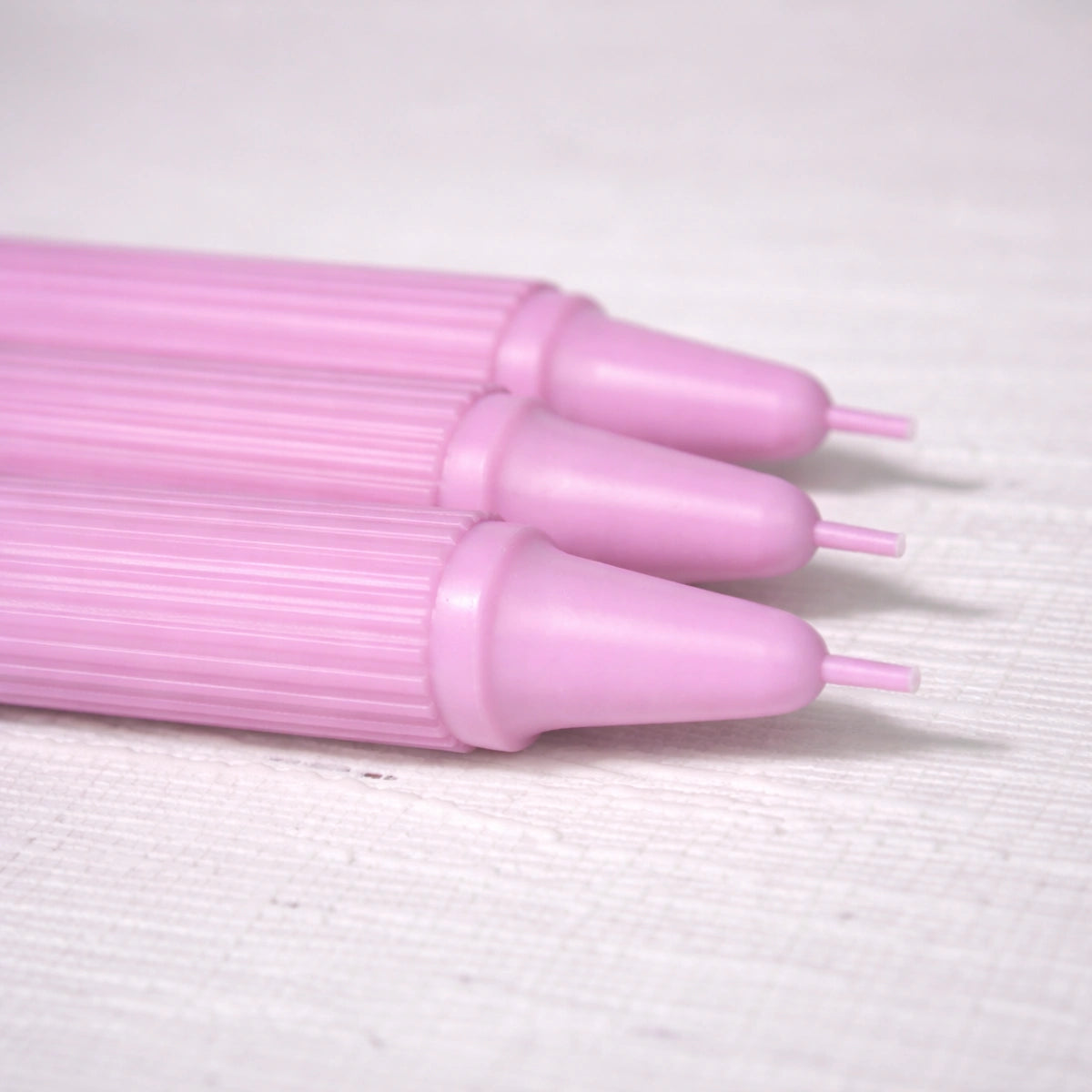 Crown-Forming Taper Candle Pink